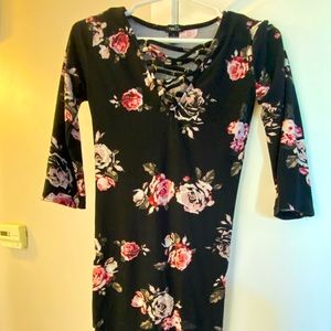 Black floral form fitted midi dress with laced up deep V neck